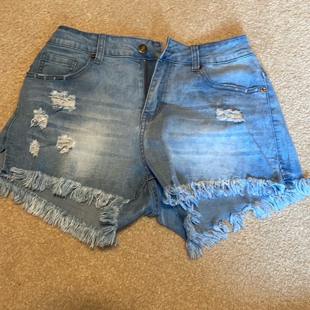 women’s ripped and distressed jean shorts fringe on end high waisted